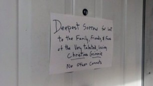 A handwritten note is posted on Kevin James Loibl's family home in St. Petersburg, Florida.