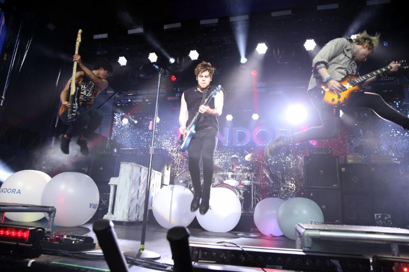 Recording artists Calum Hood, Luke Hemmings, Ashton Irwin, and Michael Clifford of 5 Seconds of Summer perform onstage