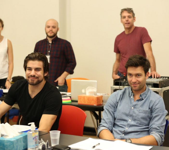 L-R: Cast members Alex Esola and Danny Binstock (both seated) during rehearsal for the Young Vic production of “A View From the Bridge.”