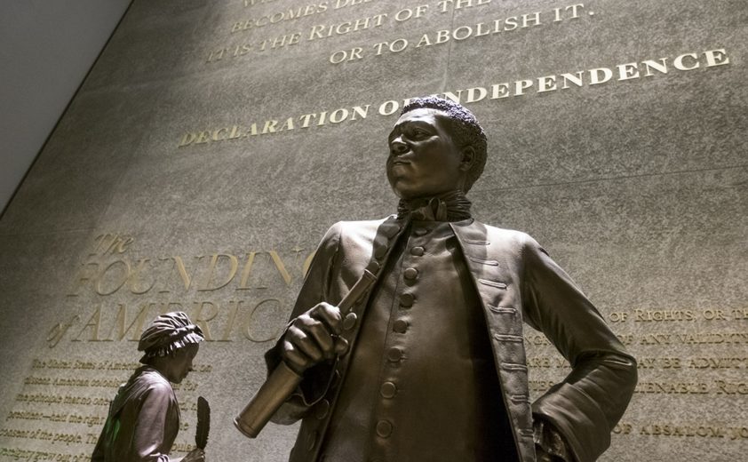 Wednesday September 14, 2016  Press Preview of the soon to be open Smithsonian National Museum of African American David M. Rubinstein Historical Galleries Slavery and the Making of a New Nation exhibit  stands a statue of Benjamin Baaneker who challenged Thomas Jefferson on the status of slaves. ED HILLE / Staff Photographer