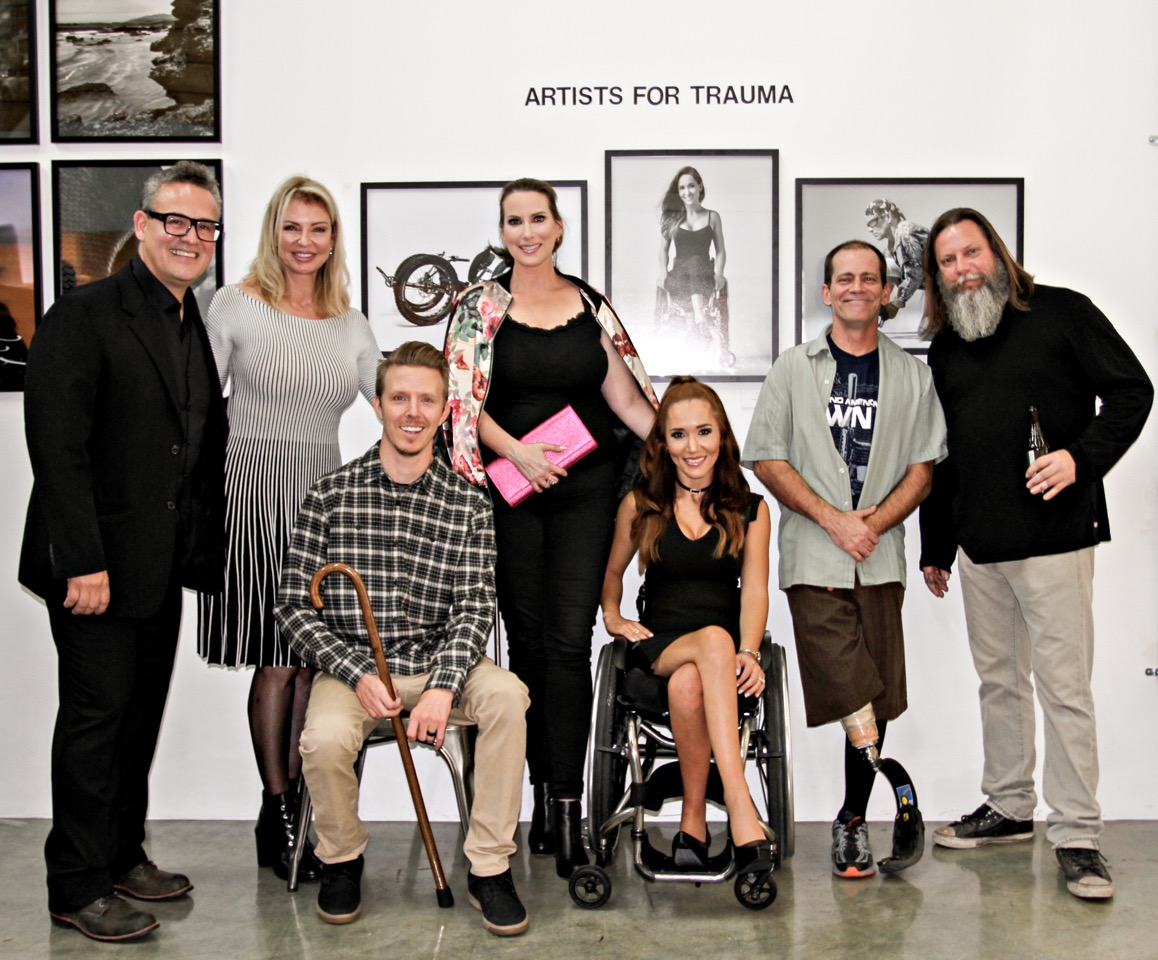 From left to right Per Bernal - World renowned artist, Laura Sharpe - Artists for Trauma Founder and CEO, Aaron Baker - AFT Ambassador/Model, Megan Phillips - Sur le Mur Founder, Tamara Mena - AFT Ambassador/Model Steve Bogna - AFT Ambassador/Model and Kelly 'Risk' Graval - world renowned artist. Photo courtesy of Kerstin Alm aka Mamarazzi