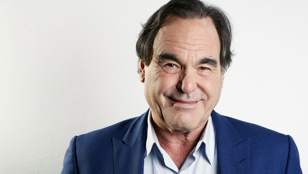 In this Wednesday, Nov. 14, 2012, photo, American film director, screenwriter and producer Oliver Stone poses for a portrait in New York. Oliver Stone has never been shy about ruffling feathers with his take real-life events. From “J.F.K” and “Nixon,” to “Salvador” and “W,” Stone has challenged the history that we know by incorporating a revisionist view. His latest project, “The Untold History of the United States," a ten-part series, currently on the premium Showtime network, explores the facts he feels were suppressed for one reason or another. (Photo by Carlo Allegri/Invision/AP)