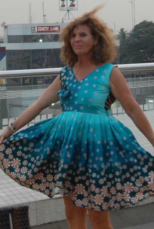 Sheryl Aronson in a dress by Oby African Fashions