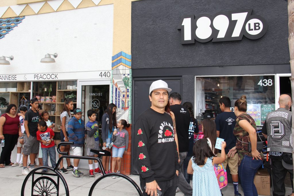 Francisco "Tito" Rodriguez the Hood Santa anticipates the start of the 2nd Annual Backpack Giveaway (Photo by: Fredwill Hernandez/The Hollywood 360)