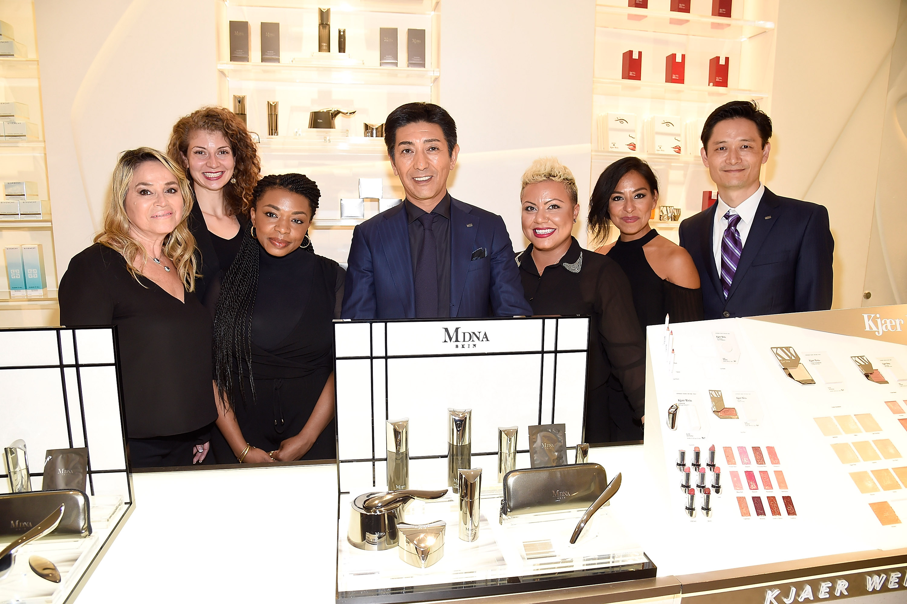 NEW YORK, NY - SEPTEMBER 26:   Tsuyoshi Matsushita, President of MTG Co., Ltd (C) during the launch of  MDNA SKIN collection at Barneys New York on September 26, 2017 in New York City.  (Photo by Kevin Mazur/Getty Images for MDNA SKIN)