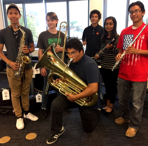 Samueli Academy students were excited to try out the new donated instruments. 