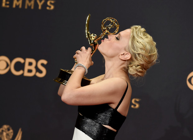 Kate McKinnon poses in the press room with the award for outstanding supporting actress in a comedy series for "Saturday Night Live" at the 69th Primetime Emmy Awards on Sunday, Sept. 17, 2017, at the Microsoft Theater in Los Angeles. (Photo by Jordan Strauss/Invision/AP)